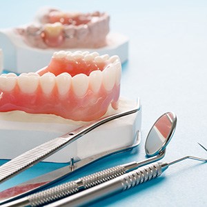 a full denture on a plaster mold of a mouth