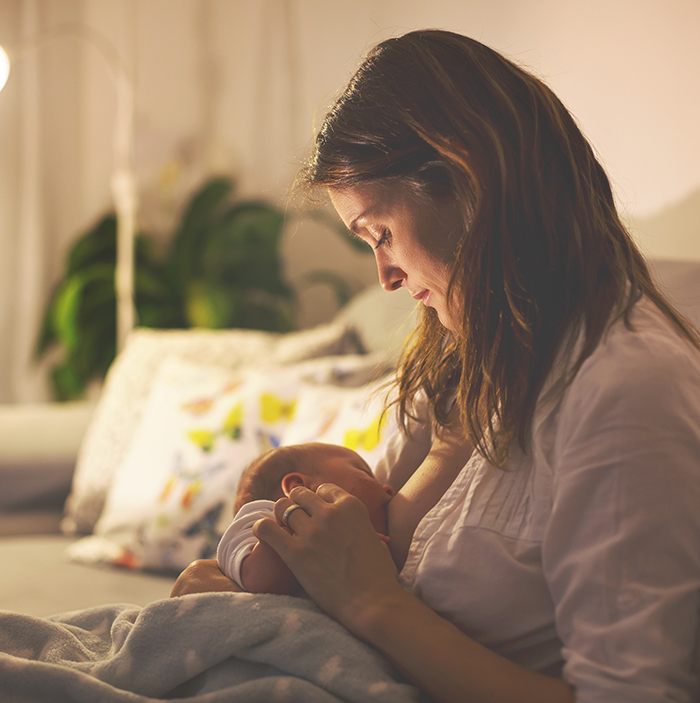 Woman breastfeeding a baby